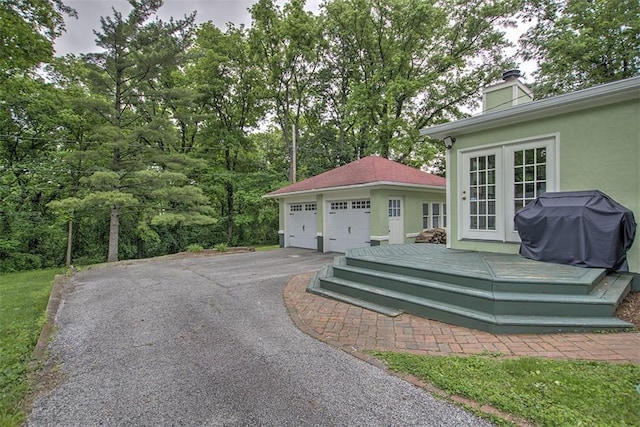 2064 William St, Decatur, IL 62522 - wooden terrace featuring a garage and a grill