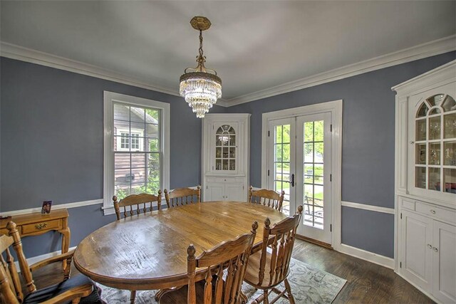2064 William St, Decatur, IL 62522 - dining space with a chandelier, baseboards, french doors, dark wood-style floors, and crown molding