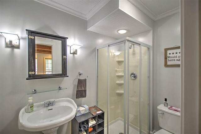 2064 William St, Decatur, IL 62522 - bathroom featuring toilet, a shower stall, a sink, and crown molding