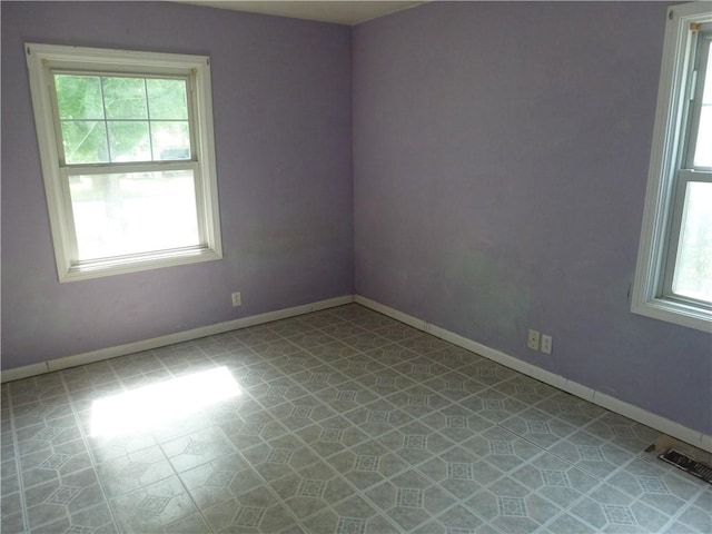 1610 Glenview Ave, Danville, IL 61832 - spare room featuring baseboards