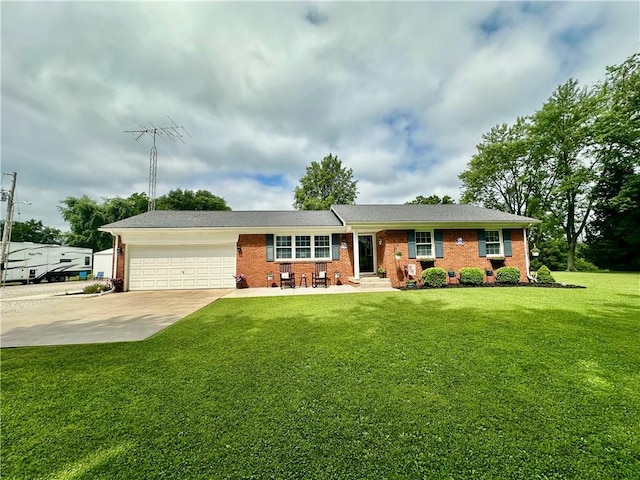 31508 1800 E Rd, Rossville, IL 60963 - ranch-style home featuring an attached garage, concrete driveway, a front lawn, and brick siding