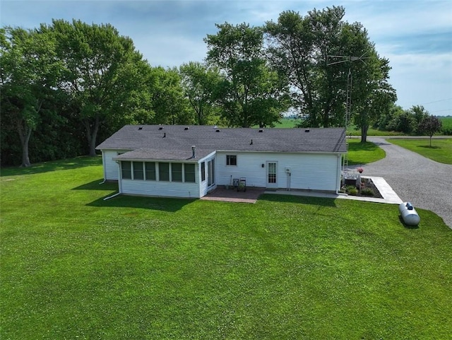 31508 1800 E Rd, Rossville, IL 60963 - back of property with a patio and a yard
