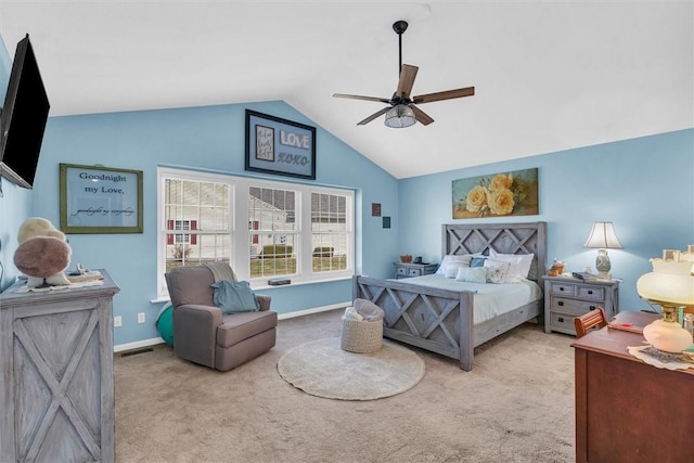 carpeted bedroom featuring visible vents, lofted ceiling, baseboards, and a ceiling fan