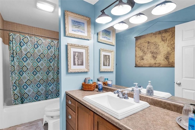 bathroom with vanity, shower / tub combo, and toilet