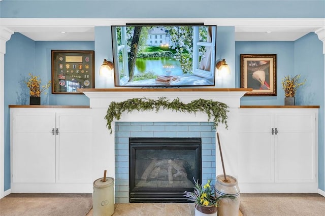 details featuring carpet flooring and a fireplace