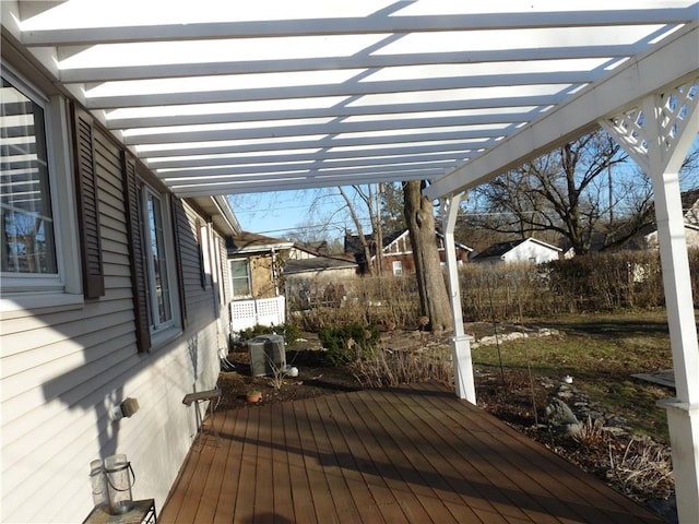 wooden terrace with a pergola and central AC