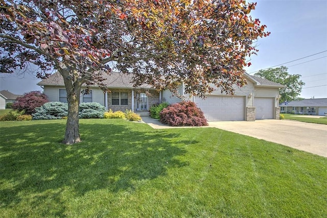 1310 Country Ln, Mt Zion, IL 62549 - view of property hidden behind natural elements featuring driveway, a garage, and a front yard