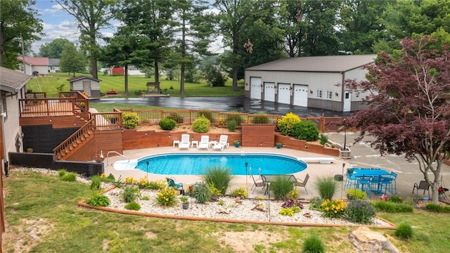 14480 N 1025th St, Effingham, IL 62401 - view of swimming pool with an outbuilding, a diving board, stairway, a lawn, and a wooden deck