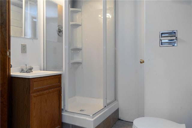 702 N Oakwood St, Effingham, IL 62401 - bathroom with toilet, a shower stall, and vanity