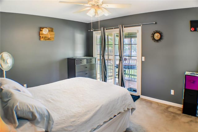 1203 Adams Ave, Charleston, IL 61920 - bedroom with carpet, a ceiling fan, and access to exterior