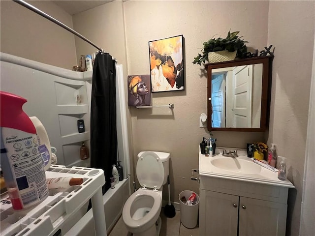 full bath featuring vanity, tile patterned flooring, toilet, and shower / tub combo with curtain