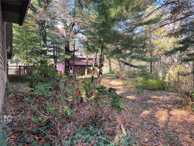 view of yard with a deck