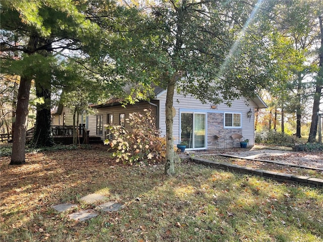 rear view of property with a deck