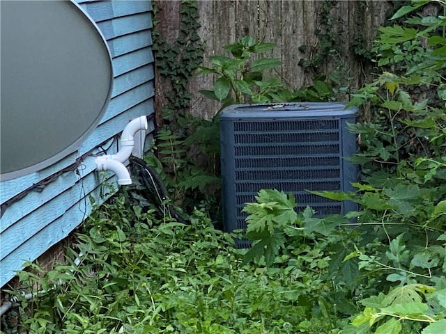 1105 Edgar Ave, Mattoon, IL 61938 - exterior view of a central air condition unit