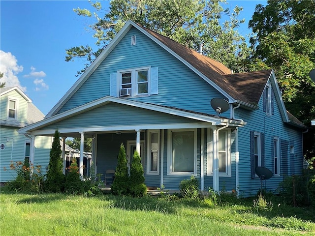 1105 Edgar Ave, Mattoon, IL 61938 - view of front of house featuring covered porch and cooling unit