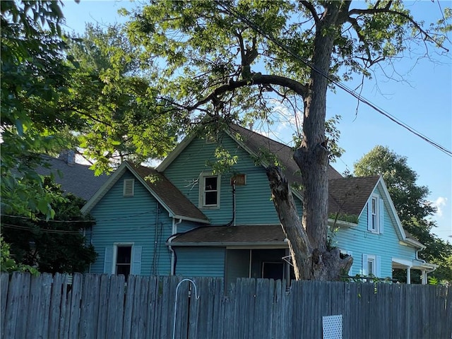 1105 Edgar Ave, Mattoon, IL 61938 - view of side of property featuring roof with shingles