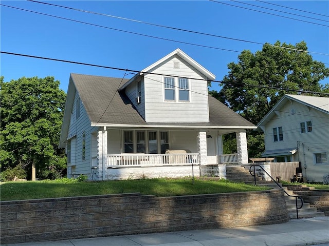 764 10th St, Charleston, IL 61920 - view of front of property featuring a porch and roof with shingles