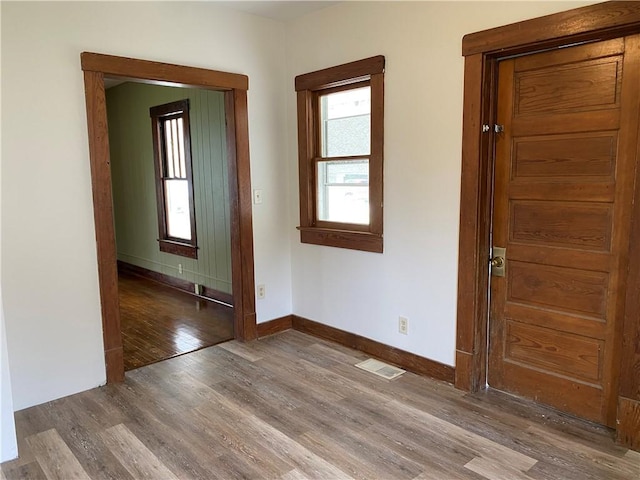 764 10th St, Charleston, IL 61920 - unfurnished room featuring wood finished floors and baseboards