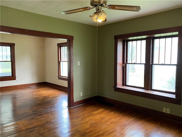 764 10th St, Charleston, IL 61920 - spare room with wood finished floors and a ceiling fan
