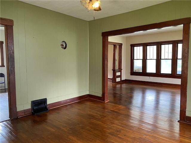 764 10th St, Charleston, IL 61920 - empty room featuring hardwood / wood-style flooring and a ceiling fan