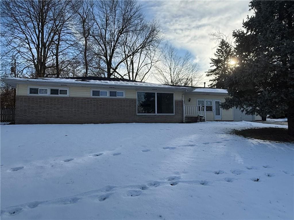 view of snow covered house