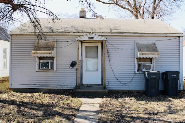 view of front of house with a chimney