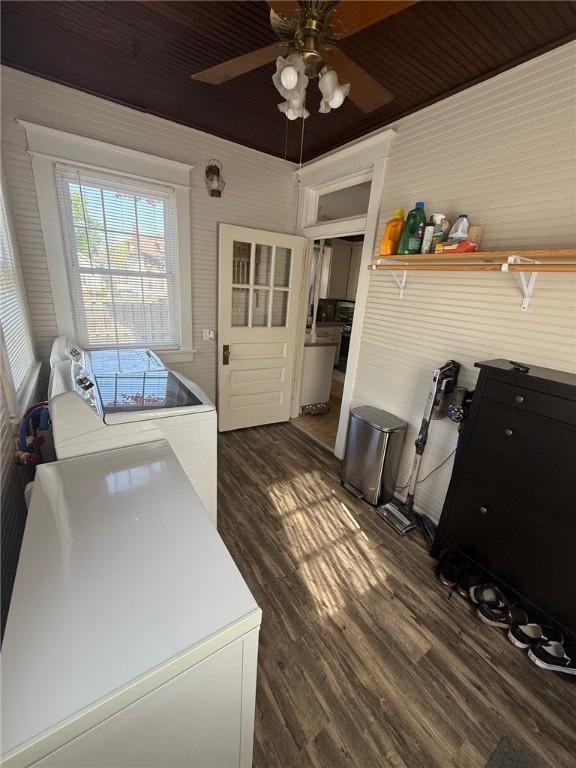 washroom with washer and dryer, dark wood-style flooring, laundry area, and ceiling fan