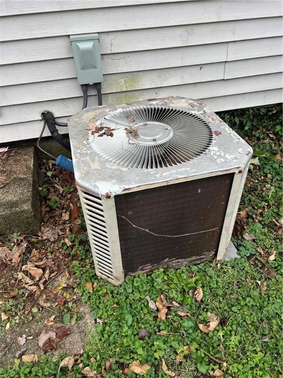 1010 S Jones St, Robinson, IL 62454 - exterior details featuring central AC unit
