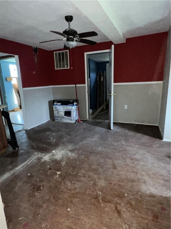 1010 S Jones St, Robinson, IL 62454 - unfurnished living room featuring ceiling fan
