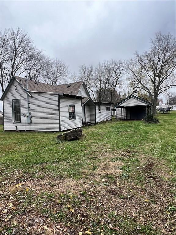 1010 S Jones St, Robinson, IL 62454 - exterior space with a lawn