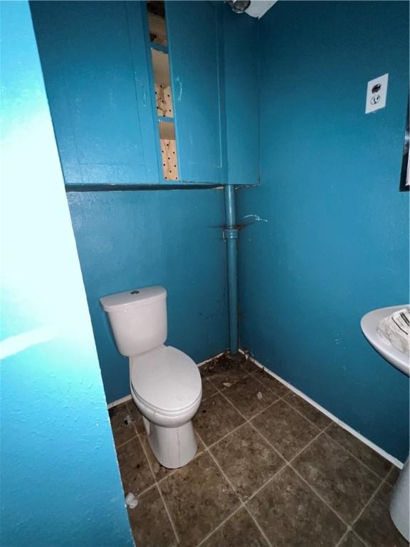 1010 S Jones St, Robinson, IL 62454 - bathroom with tile patterned flooring and toilet