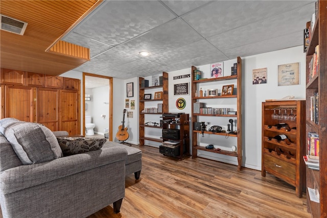 living room with light hardwood / wood-style flooring