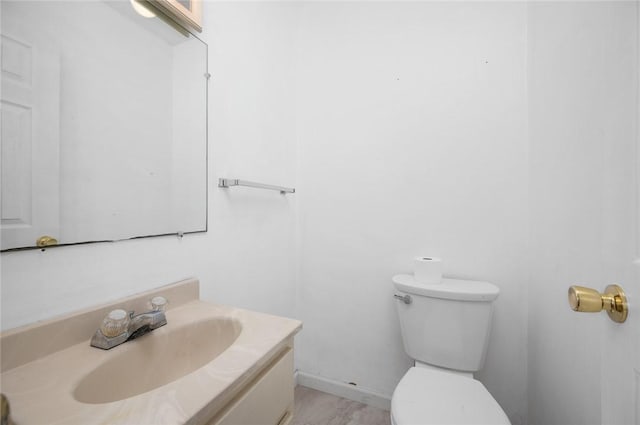 710 E Blackburn St, Paris, IL 61944 - bathroom featuring toilet and vanity