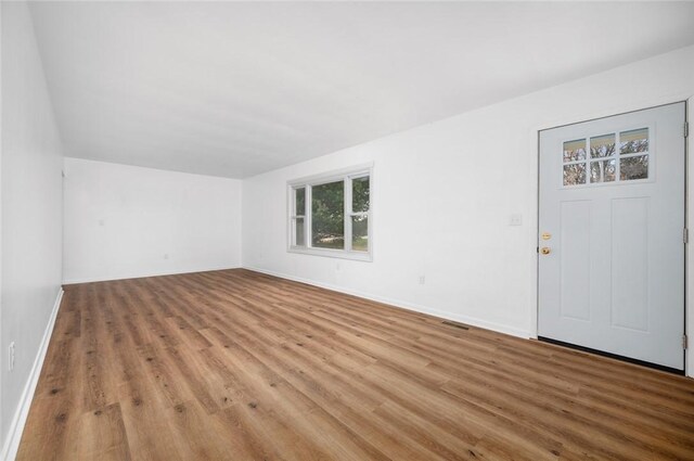 710 E Blackburn St, Paris, IL 61944 - interior space featuring wood finished floors and baseboards