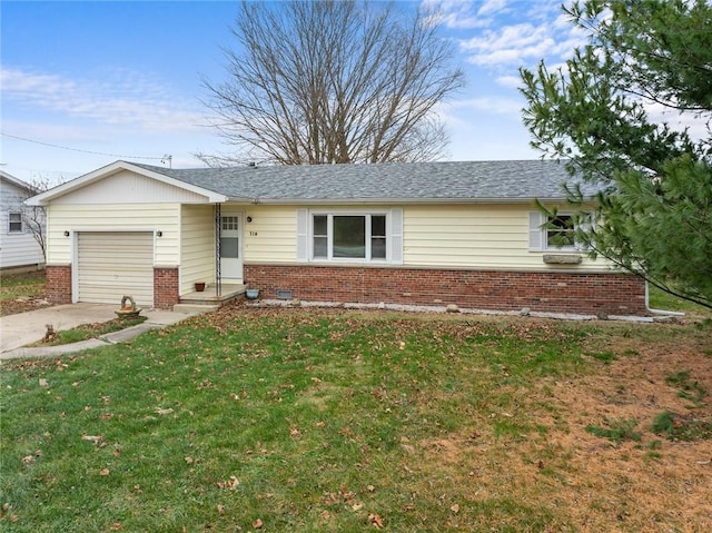 710 E Blackburn St, Paris, IL 61944 - ranch-style home featuring brick siding, an attached garage, driveway, and a front yard