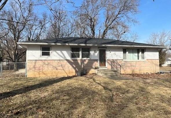 3867 Burchard Dr, Decatur, IL 62526 - view of front of house with fence and entry steps