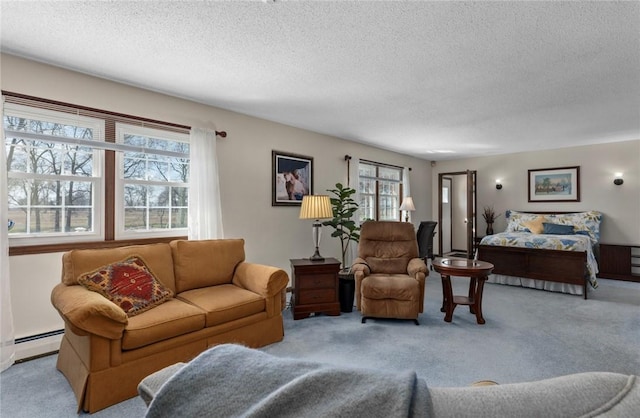 living area featuring a textured ceiling, carpet floors, and a baseboard radiator