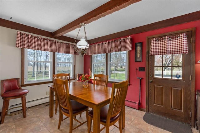 dining space featuring a baseboard radiator, light tile patterned floors, and beamed ceiling
