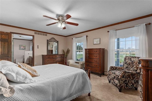 bedroom featuring ornamental molding, visible vents, ceiling fan, and light colored carpet