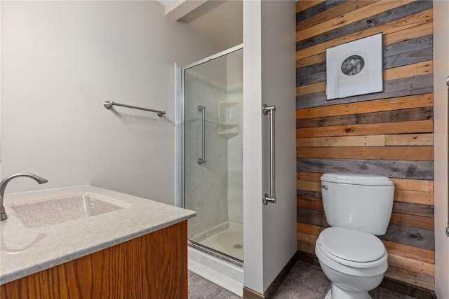 bathroom with wooden walls, toilet, a shower stall, and tile patterned flooring