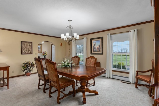 dining space with arched walkways, a notable chandelier, a wealth of natural light, and light carpet