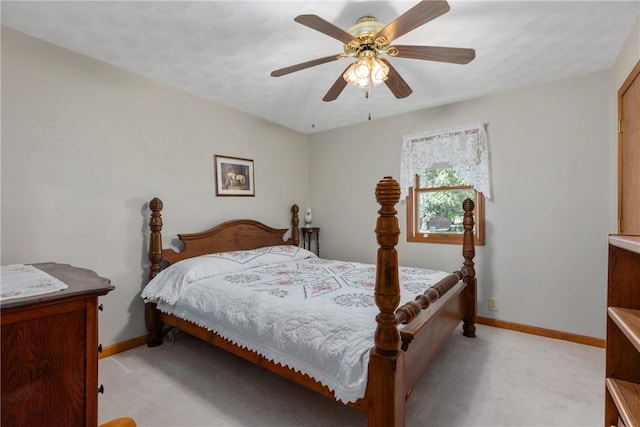 9769 Loy Chapel Rd, Effingham, IL 62401 - bedroom featuring light colored carpet, baseboards, and a ceiling fan