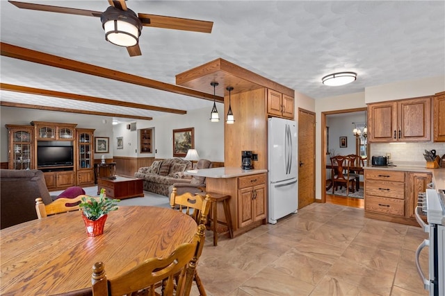 9769 Loy Chapel Rd, Effingham, IL 62401 - dining area featuring ceiling fan and beamed ceiling