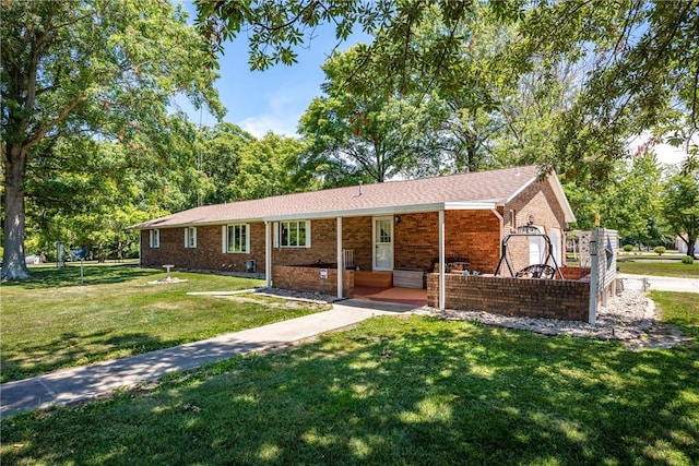 9769 Loy Chapel Rd, Effingham, IL 62401 - ranch-style house with a front yard and brick siding