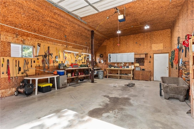 9769 Loy Chapel Rd, Effingham, IL 62401 - garage featuring a workshop area and a garage door opener
