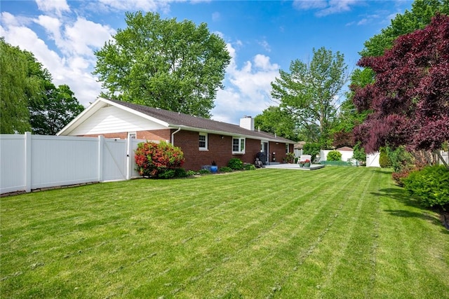 100 Pine Dr, Effingham, IL 62401 - view of yard featuring a gate and a patio area