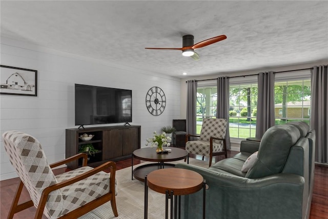 100 Pine Dr, Effingham, IL 62401 - living area featuring wood finished floors, a ceiling fan, and a textured ceiling