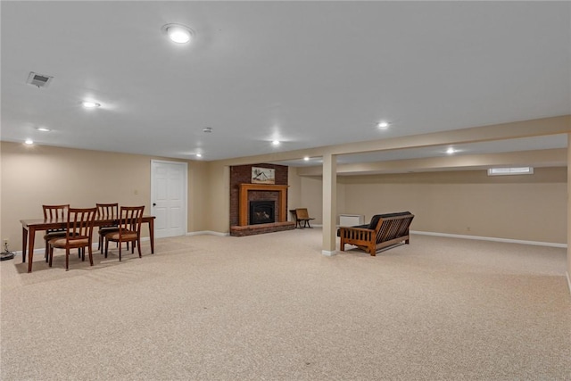 100 Pine Dr, Effingham, IL 62401 - living room with light carpet, baseboards, a fireplace, and recessed lighting