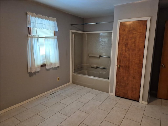 910 Glendale Ave, Tilton, IL 61833 - bathroom with tile patterned floors and tub / shower combination