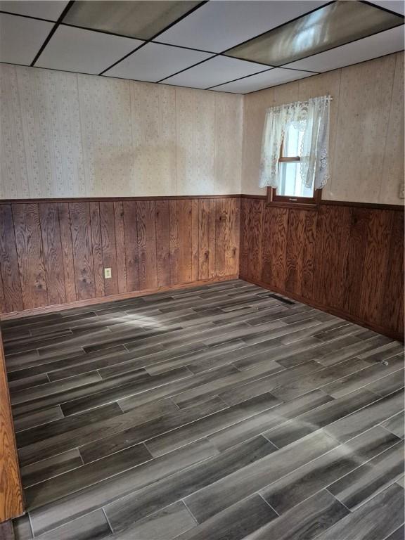910 Glendale Ave, Tilton, IL 61833 - basement with a drop ceiling and dark hardwood / wood-style floors